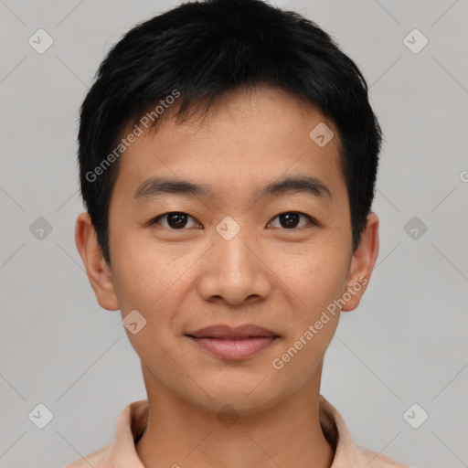 Joyful asian young-adult male with short  black hair and brown eyes