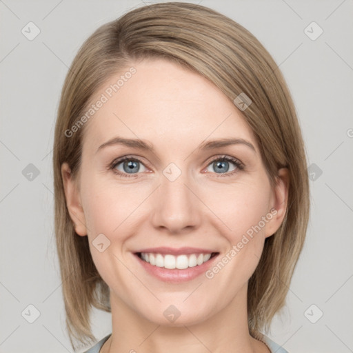 Joyful white young-adult female with medium  brown hair and green eyes