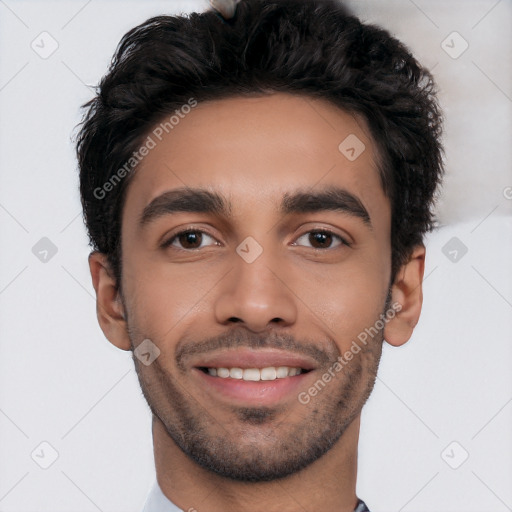 Joyful white young-adult male with short  black hair and brown eyes