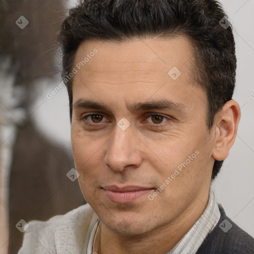 Joyful white adult male with short  brown hair and brown eyes