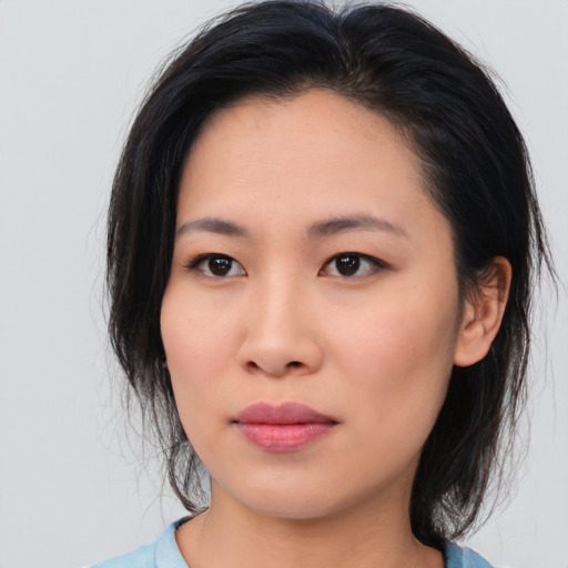 Neutral asian young-adult female with medium  black hair and brown eyes