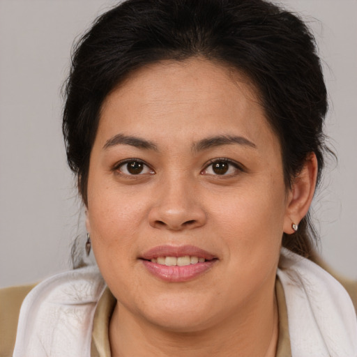 Joyful white young-adult female with medium  brown hair and brown eyes