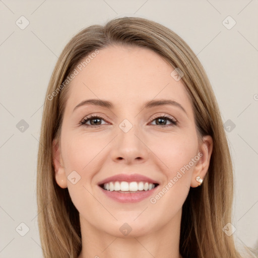 Joyful white young-adult female with long  brown hair and brown eyes