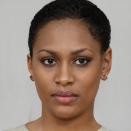 Neutral black young-adult female with short  brown hair and brown eyes