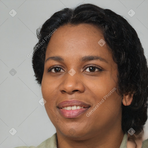 Joyful black young-adult female with medium  black hair and brown eyes