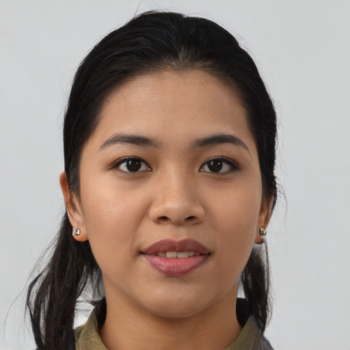Joyful asian young-adult female with medium  brown hair and brown eyes