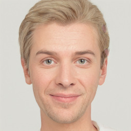 Joyful white adult male with short  brown hair and grey eyes