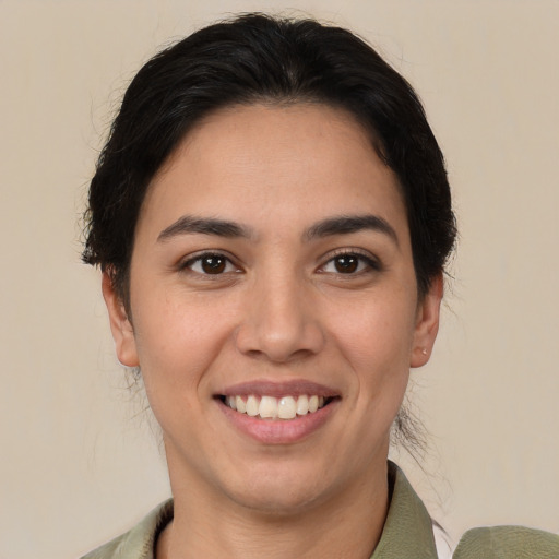 Joyful asian young-adult female with medium  brown hair and brown eyes