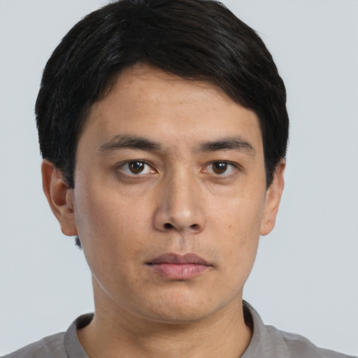Neutral asian young-adult male with short  black hair and brown eyes