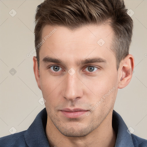 Neutral white young-adult male with short  brown hair and grey eyes