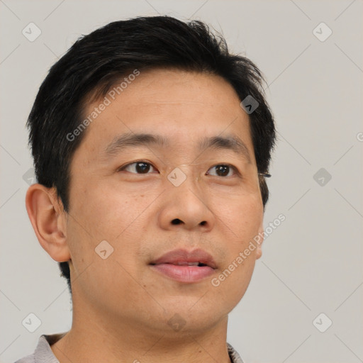 Neutral asian adult male with short  brown hair and brown eyes