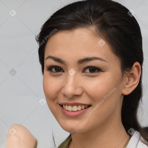 Joyful white young-adult female with medium  brown hair and brown eyes