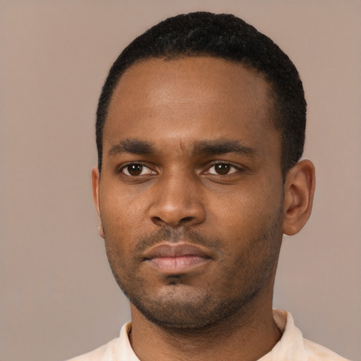 Neutral black young-adult male with short  black hair and brown eyes