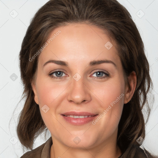 Joyful white adult female with medium  brown hair and grey eyes