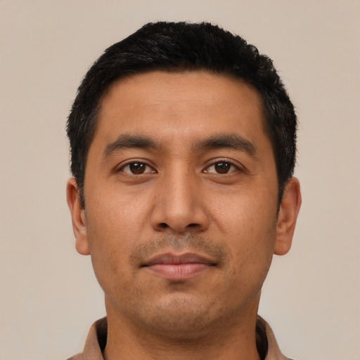 Neutral latino young-adult male with short  black hair and brown eyes