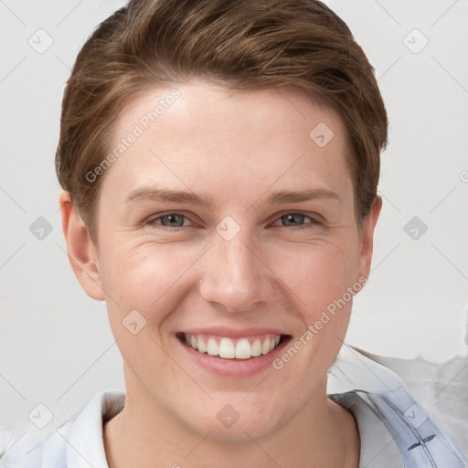 Joyful white young-adult female with short  brown hair and grey eyes