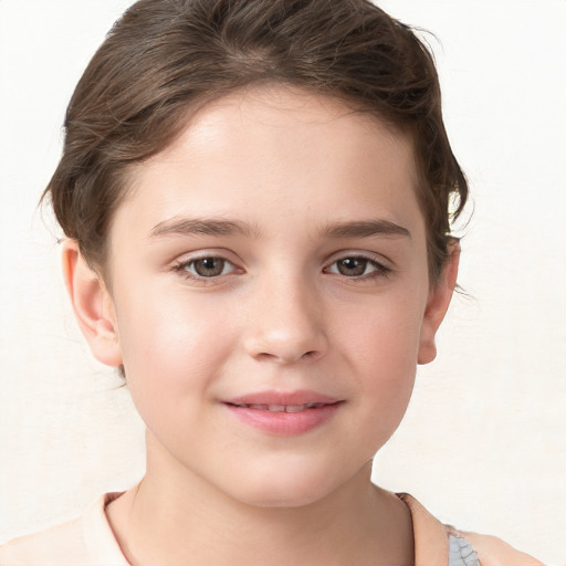 Joyful white child female with short  brown hair and brown eyes