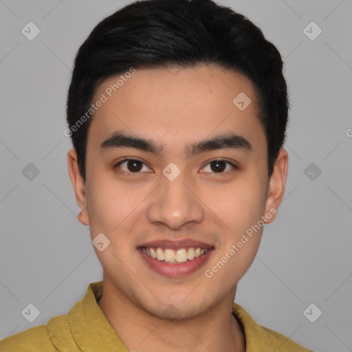 Joyful latino young-adult male with short  black hair and brown eyes