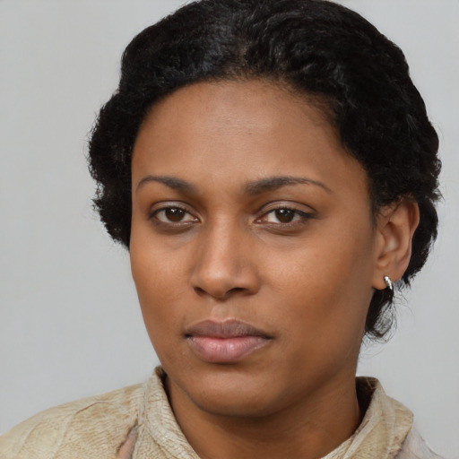 Neutral latino young-adult female with short  black hair and brown eyes