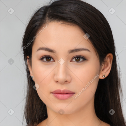 Neutral latino young-adult female with long  brown hair and brown eyes