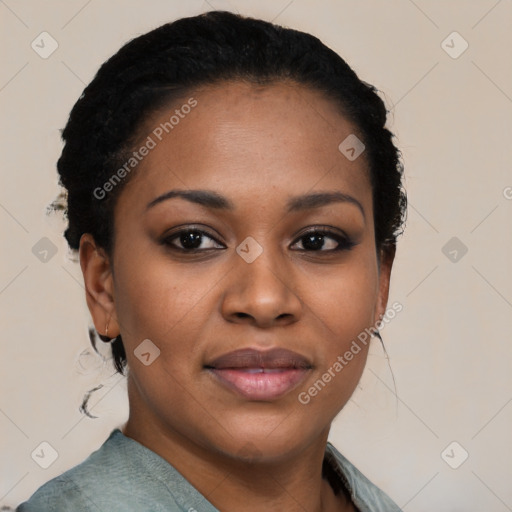 Joyful black young-adult female with medium  black hair and brown eyes