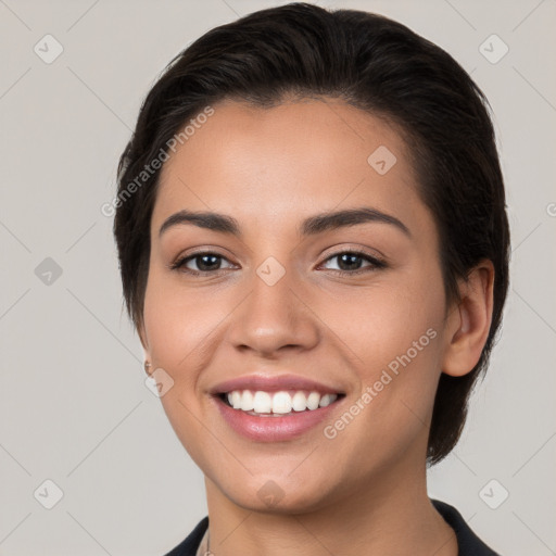 Joyful white young-adult female with short  brown hair and brown eyes