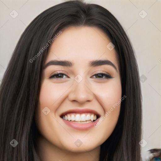 Joyful white young-adult female with long  black hair and brown eyes