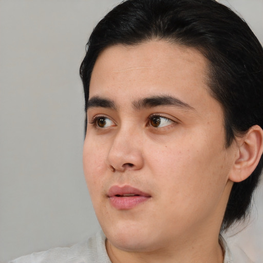 Neutral white young-adult male with medium  black hair and brown eyes
