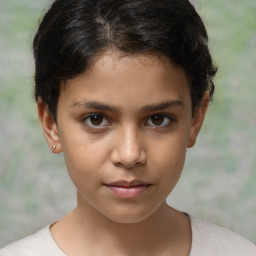 Joyful white child female with short  brown hair and brown eyes