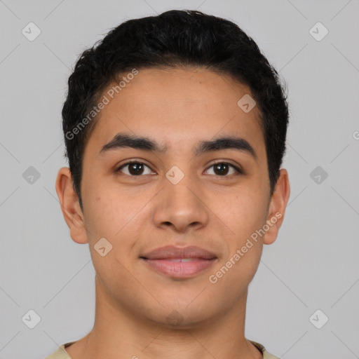 Joyful latino young-adult male with short  brown hair and brown eyes