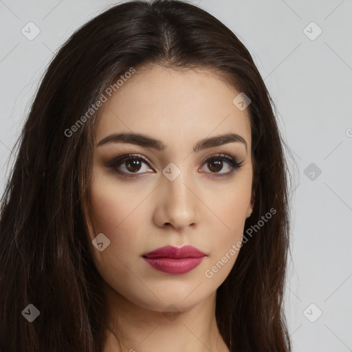 Neutral white young-adult female with long  brown hair and brown eyes