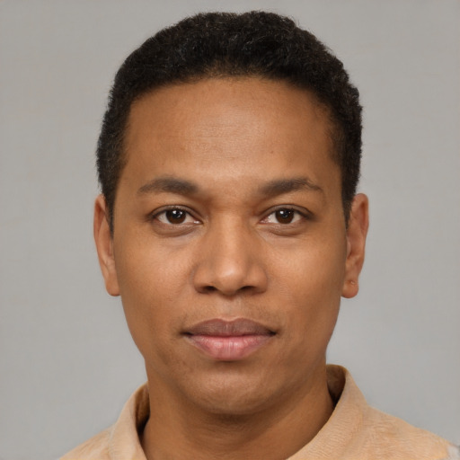 Neutral latino young-adult male with short  brown hair and brown eyes