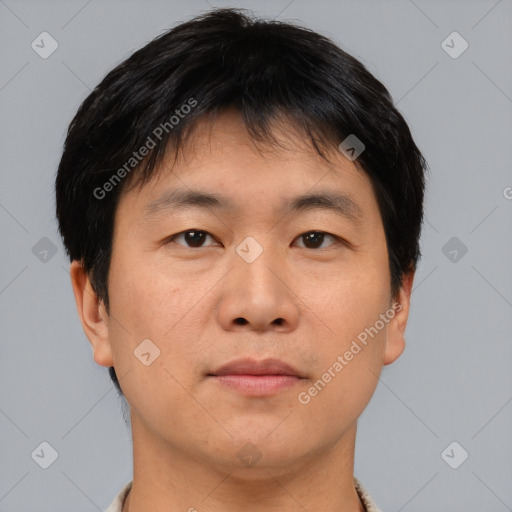 Neutral asian young-adult male with short  brown hair and brown eyes