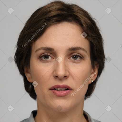 Joyful white adult female with medium  brown hair and grey eyes