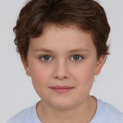 Joyful white child female with short  brown hair and brown eyes