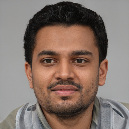 Neutral latino young-adult male with short  black hair and brown eyes