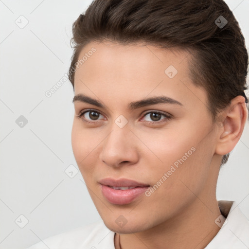 Joyful white young-adult female with short  brown hair and brown eyes