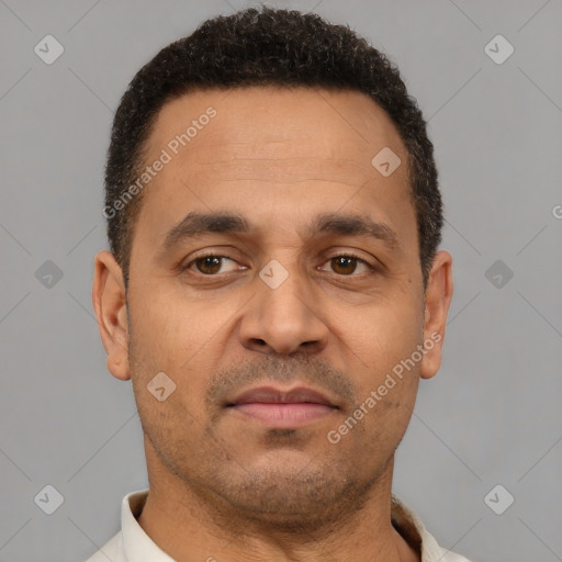 Neutral latino young-adult male with short  brown hair and brown eyes
