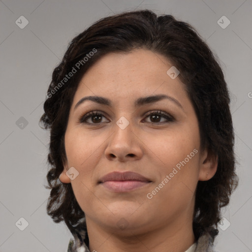 Joyful latino young-adult female with medium  brown hair and brown eyes