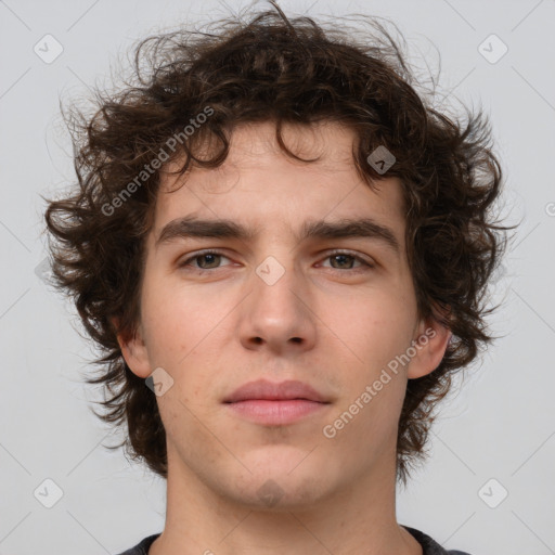 Neutral white young-adult male with medium  brown hair and brown eyes