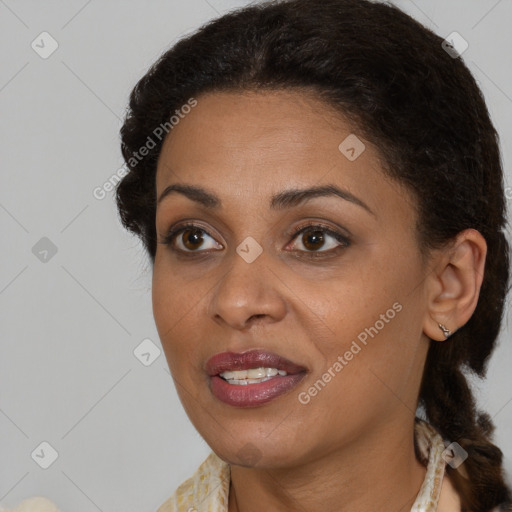 Joyful black young-adult female with medium  brown hair and brown eyes