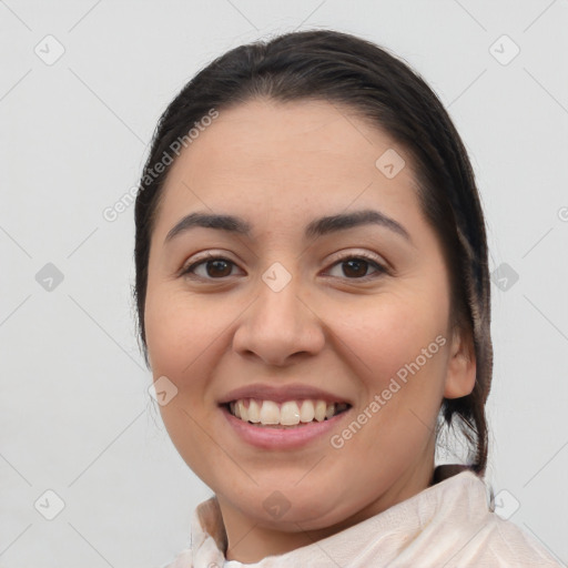 Joyful latino young-adult female with medium  brown hair and brown eyes