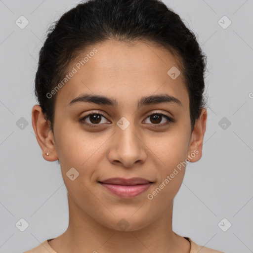 Joyful latino young-adult female with short  brown hair and brown eyes