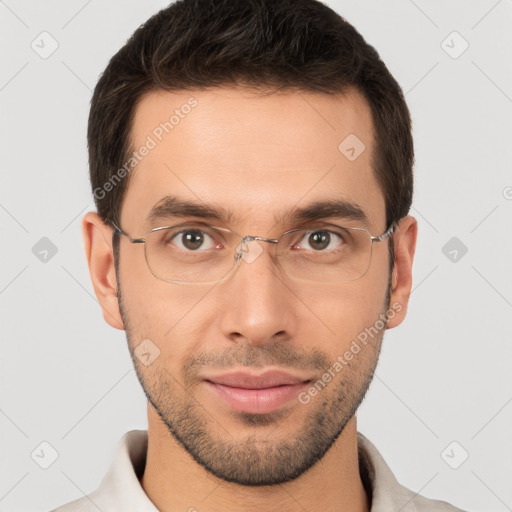 Joyful white young-adult male with short  brown hair and brown eyes