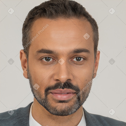 Neutral white young-adult male with short  black hair and brown eyes