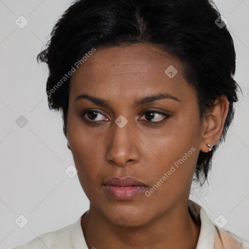 Neutral latino young-adult female with medium  black hair and brown eyes