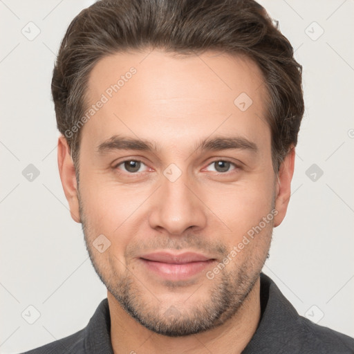 Joyful white young-adult male with short  brown hair and brown eyes