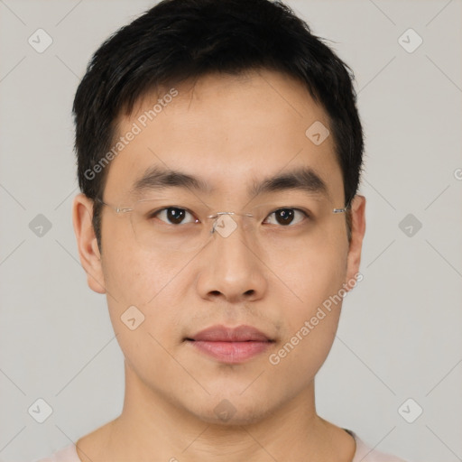 Neutral asian young-adult male with short  black hair and brown eyes