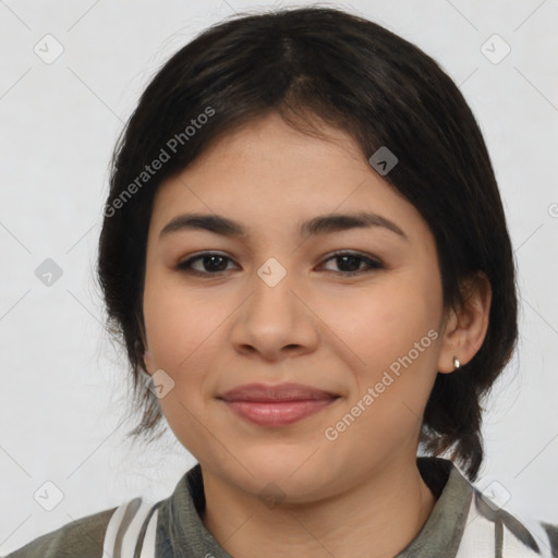 Joyful latino young-adult female with medium  brown hair and brown eyes