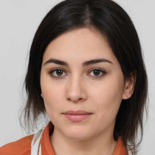 Neutral white young-adult female with medium  brown hair and brown eyes